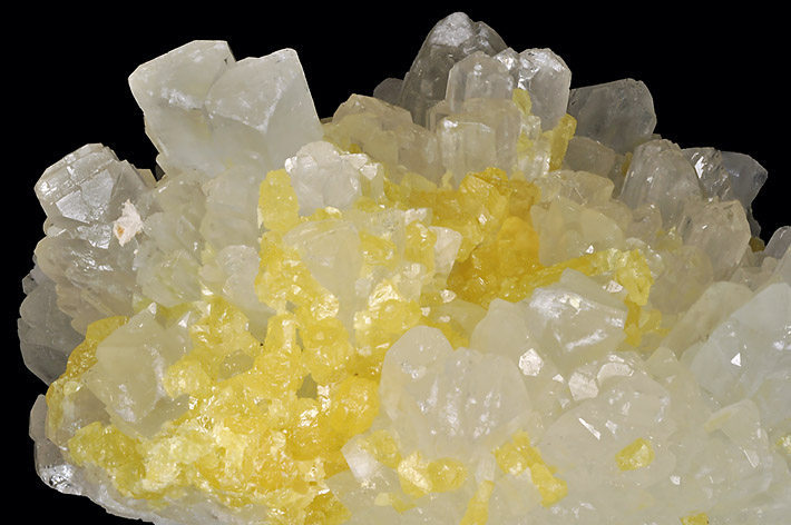White celestine crystals with yellow sulfur from classic locality in Agrigento, Sicily, Italy