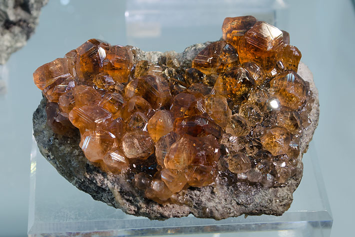 Hessonite crystals from Jeffrey Mine, Canada