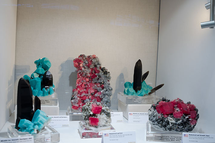 Display of the fine amazonite and rhodochrosite specimens from Colorado